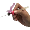 Hand holding applicator with needle.png